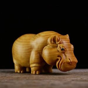 Adorn Your Space with Africa's Three Treasures: Sculptures and Figurines for Interior Elegance
