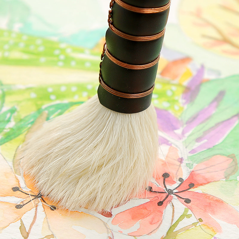 Pointed watercolor brush